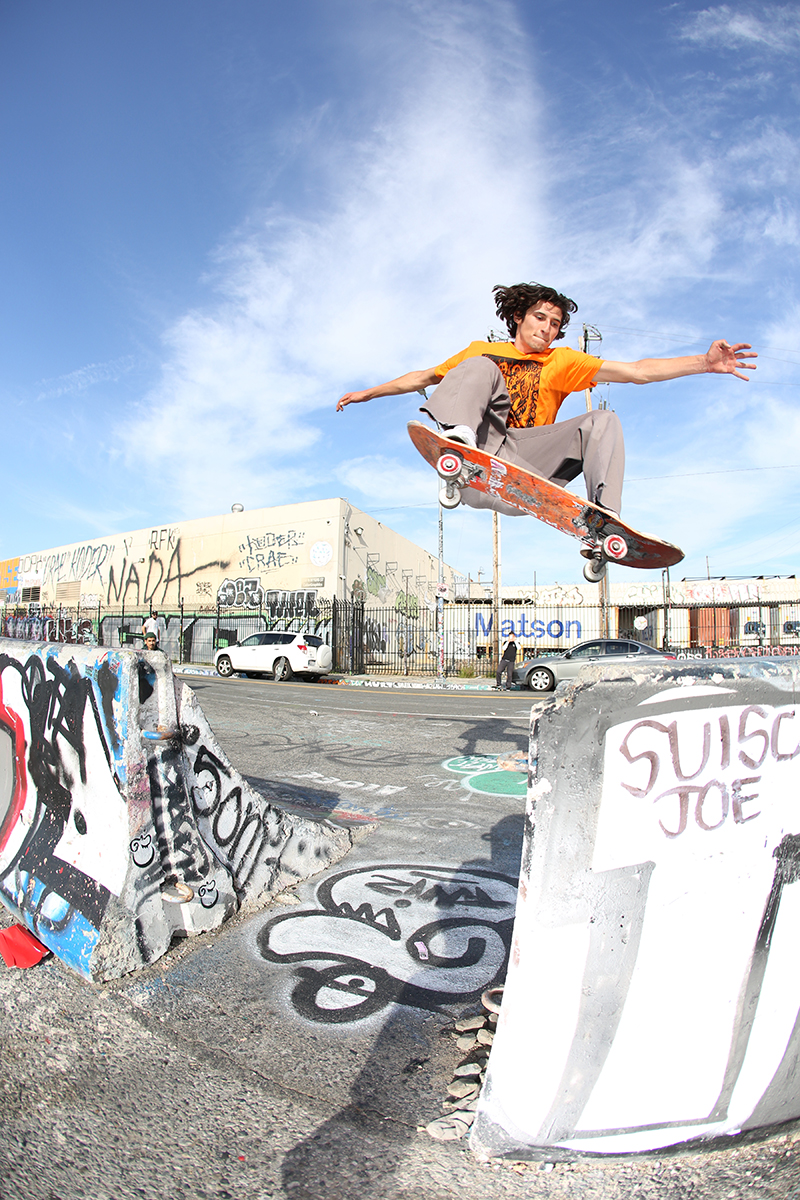 Jacob Saucedo. Frontside ollie transfer at a barrier spot in L.A. Photo: Tyler Hopkins